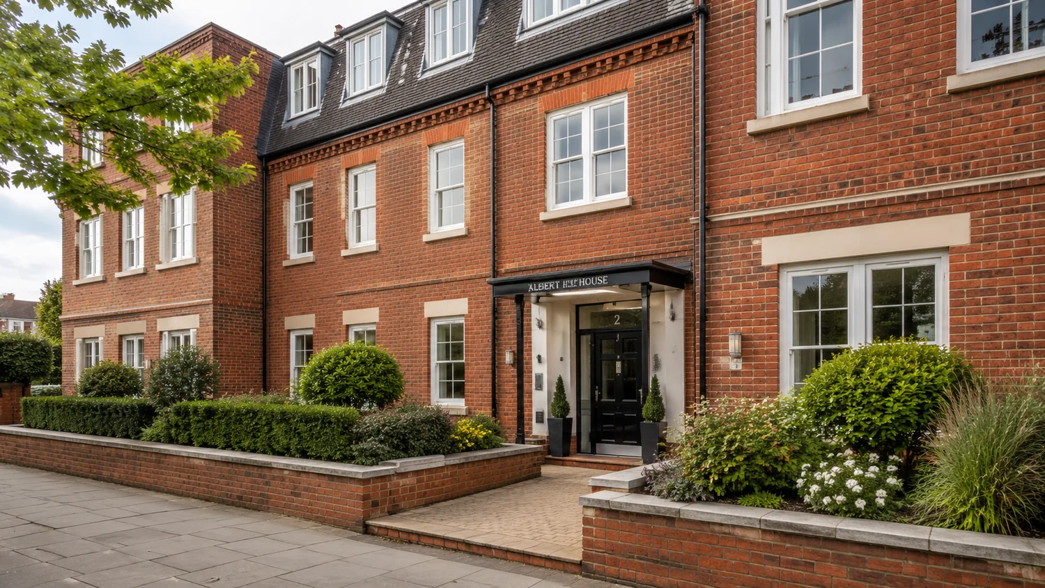 A well-maintained British residential block representing a property portfolio